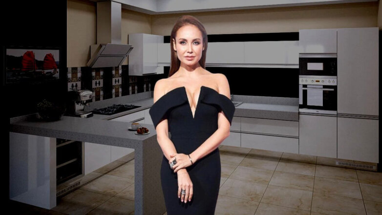 Ляйсан Утяшева в вечернем платье села на шпагат прямо на столе: видео