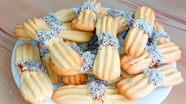 30 минут на кухне: рассыпчатое печенье "бантики" – простой и быстрый рецепт лакомства к чаю