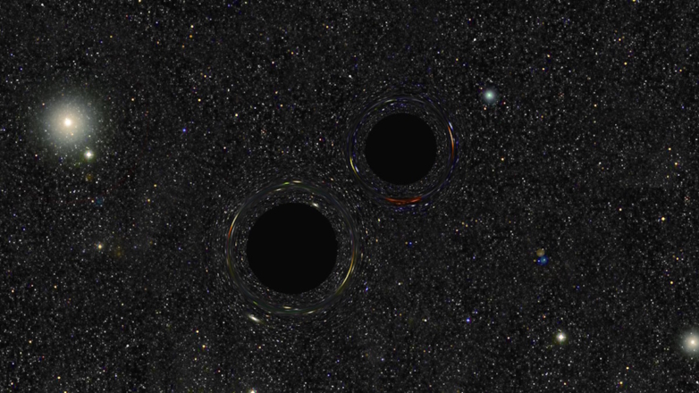 Две сверхмассивные черные дыры оказались на грани столкновения из-за слияния галактик